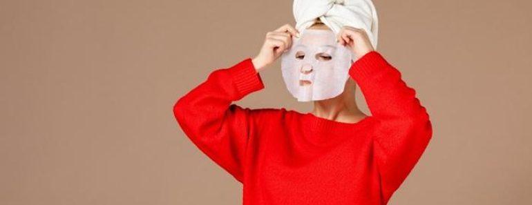 front view young female preparing apply face mask pink background 140725 68386