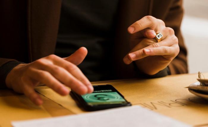 close up guy with ring smartphone 23 2148450773